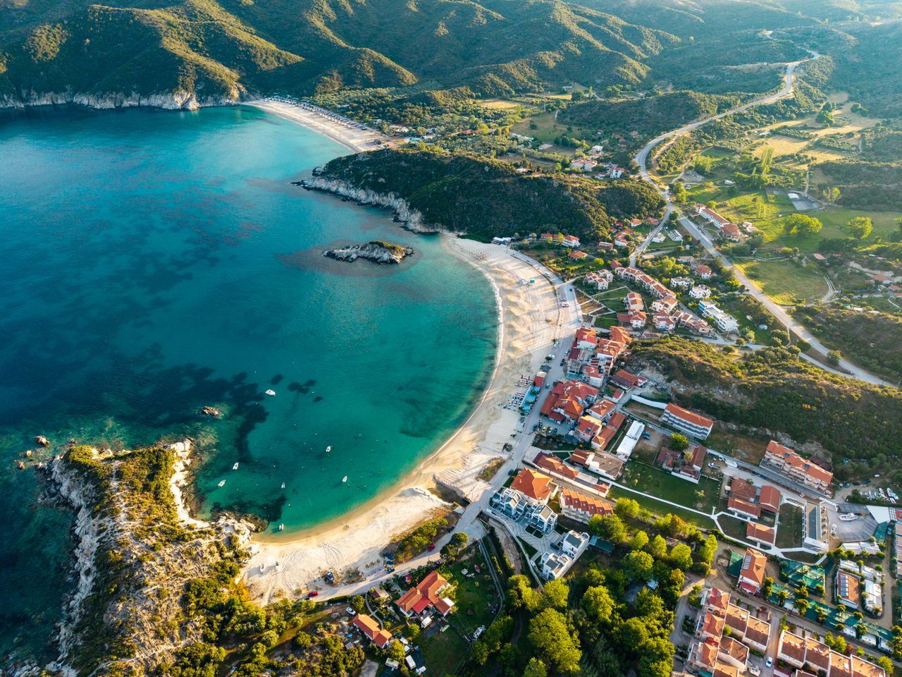 About Explore the scenic beauty of Kalamitsi Beach, a stunning coastal paradise in Sithonia, Greece.